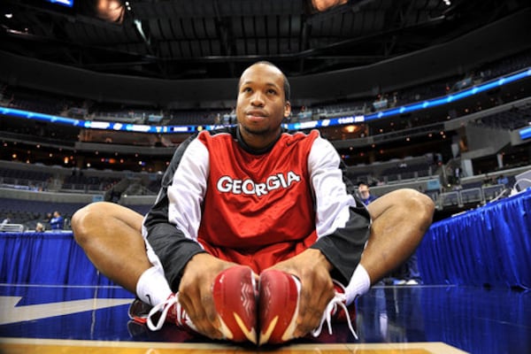 UGA guard Sundiata Gaines stretches before the game against Xavier.