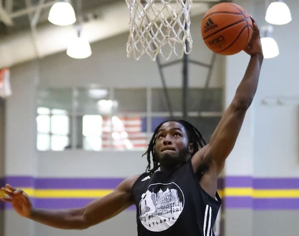 050422 Atlanta: Tyquan O'Neal with the Pittman Panthers Black goes to the basket while preparing to play team 24/7 at Atlanta Mayor Andre Dickens’ Midnight Basketball League which serves an anti-crime initiative at the C.T. Martin Recreation Center on Wednesday, May 4, 2022, in Atlanta.    “Curtis Compton / Curtis.Compton@ajc.com”