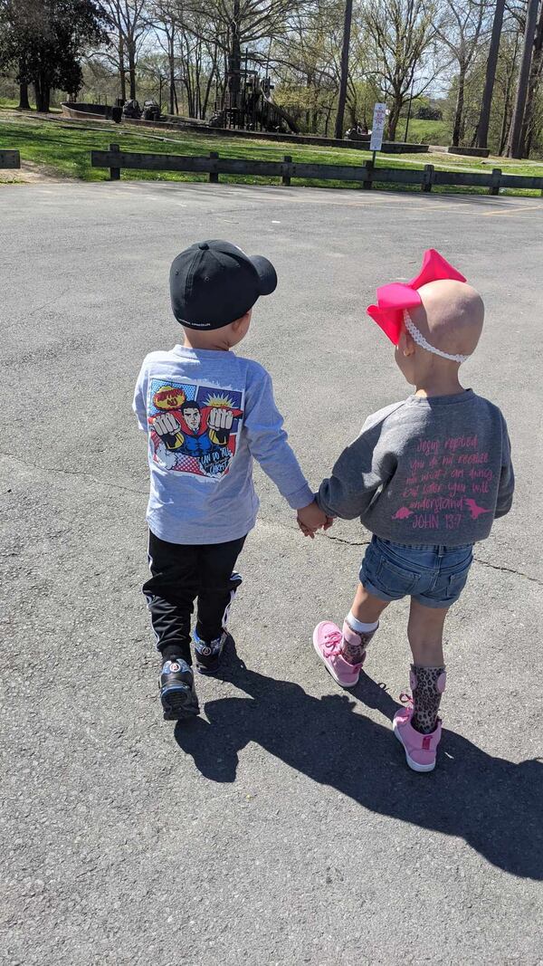 Sawyer Vines and Levi Lansdell met at Children's Healthcare of Atlanta Egleston Hospital. The two became best friends, and their parents also formed a close friendship, during their long hospital stay for cancer treatments. Both children are now out of the hospital and their cancer is in remission. Photo courtesy of CURE Childhood Cancer