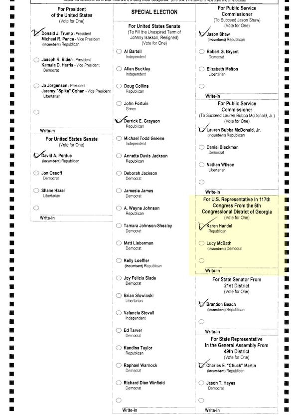 A voter used check marks to fill in a ballot and appeared to miss nearly all of a bubble in the 6th Congressional District election.