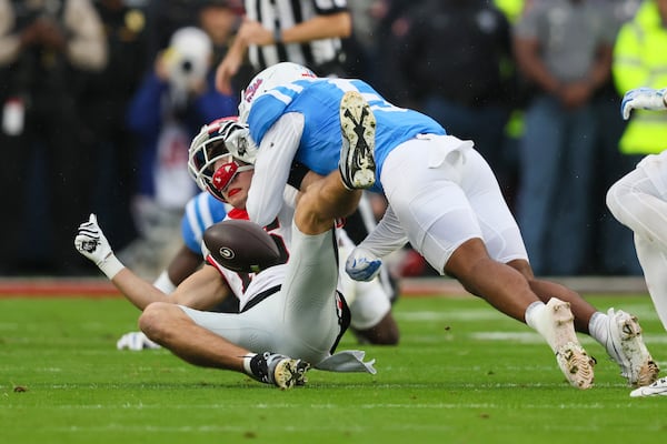 Georgia wide receiver London Humphreys (16) is unable to hold onto the ball for a catch as Mississippi safety John Saunders Jr. (5) hits Humphreys during the first quarter at Vaught Hemingway Stadium, Saturday, November 9, 2024, in Oxford, Ms. (Jason Getz / AJC)
