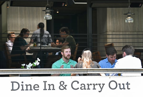 Most Atlanta restaurant operators, like South City Kitchen, are not in a hurry to increase capacity, as allowed under Gov. Brian Kemp's latest pandemic emergency order. (Hyosub Shin / Hyosub.Shin@ajc.com)