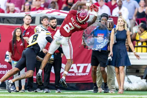 Missouri cornerback Marcus Clarke (8) defends against a pass to Alabama wide receiver Ryan Williams (2) during the second half of an NCAA college football game, Saturday, Oct. 26, 2024, in Tuscaloosa, Ala. (AP Photo/Vasha Hunt)