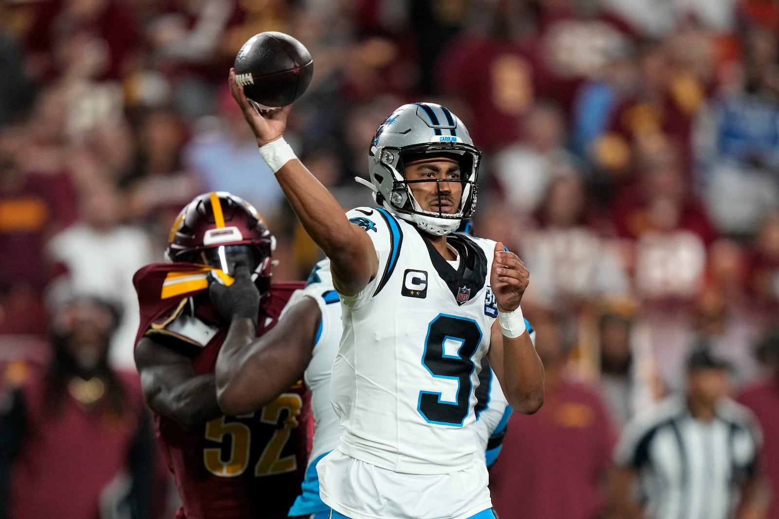 Carolina Panthers quarterback Bryce Young throws a pass during the second half of an NFL football game against the Washington Commanders, Sunday, Oct. 20, 2024, in Landover, Md. (AP Photo/Stephanie Scarbrough)