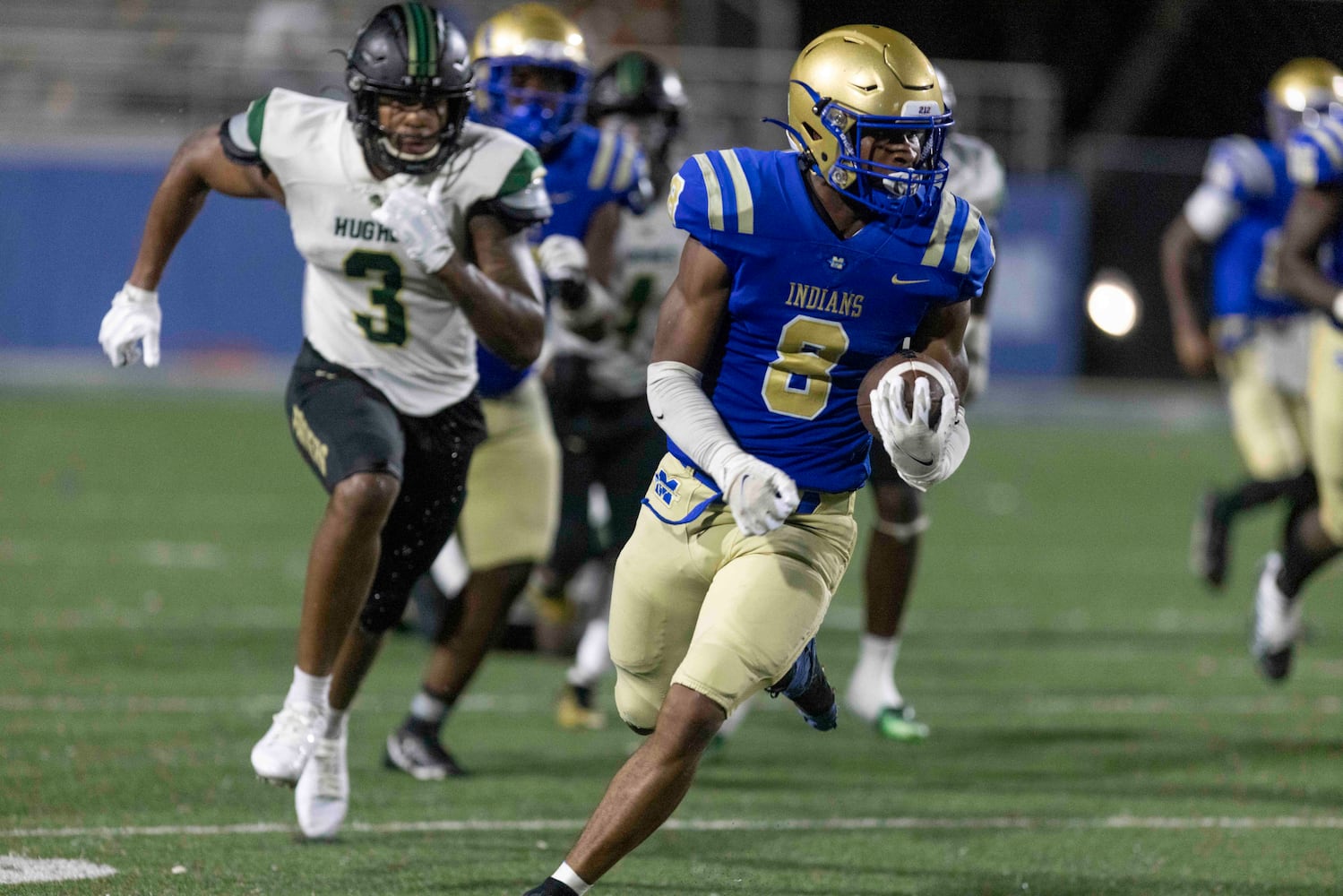 McEachern’s Jaylon Brown (8) runs the ball during a GHSA High School football game between Langston Hughes High School and McEachern High School at McEachern High School in Powder Springs, GA., on Friday, August 26, 2022. (Photo by Jenn Finch)