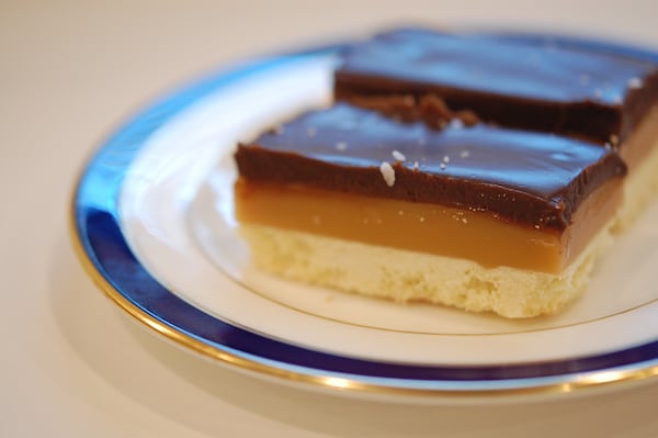 This recipe for Million Dollar Bars, whose layers include caramel and chocolate ganache, uses Irish butter. (Meridith Ford for The Atlanta Journal-Constitution)