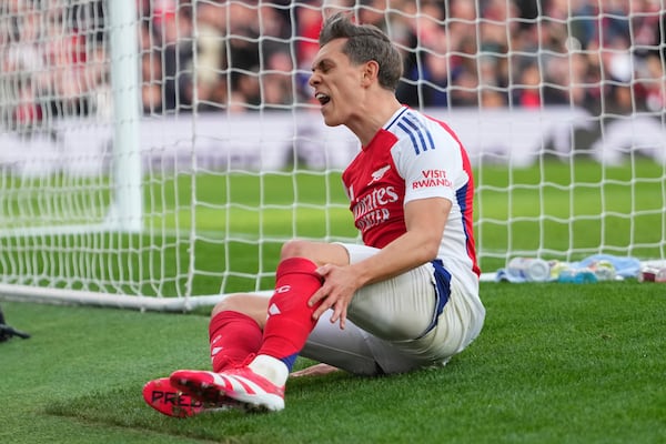 Arsenal's Leandro Trossard reacts after missing a scoring chance during the English Premier League soccer match between Arsenal and West Ham United at Emirates stadium in London, Saturday, Feb. 22, 2025. (AP Photo/Kirsty Wigglesworth)