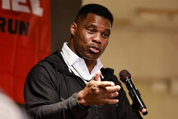 Republican U.S. Senate candidate Herschel Walker talks to voters in Rome, Ga. on Monday, October 24, 2022. (Natrice Miller/natrice.miller@ajc.com)  