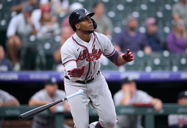 Atlanta Braves' Jorge Soler watches his solo home run off Colorado Rockies starting pitcher Chi Chi Gonzalez during the first inning of a baseball game Thursday, Sept. 2, 2021, in Denver. (AP Photo/David Zalubowski)