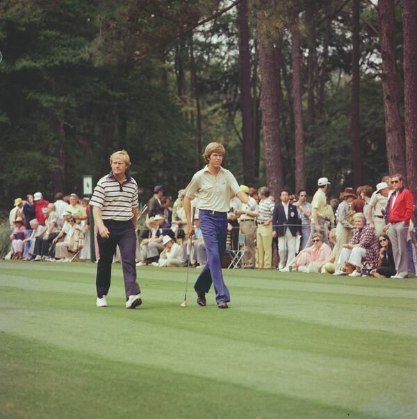 Jack Nicklaus and Fred Ridley stride down the 14th fairway during the 1976 Masters Tournament. (Photo by Augusta National/Getty Images)