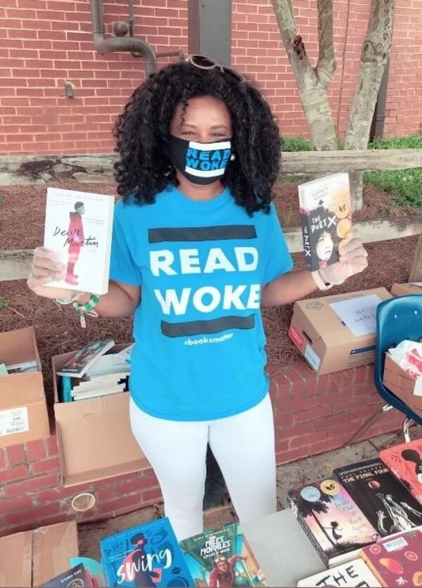 Cicely Lewis, school librarian at Gwinnett County’s Meadowcreek High School in Norcross, created Read Woke, a program in which students explore literature that challenges social norms. Her program has received worldwide acclaim and is now used in many schools. (Courtesy of Cicely Lewis)