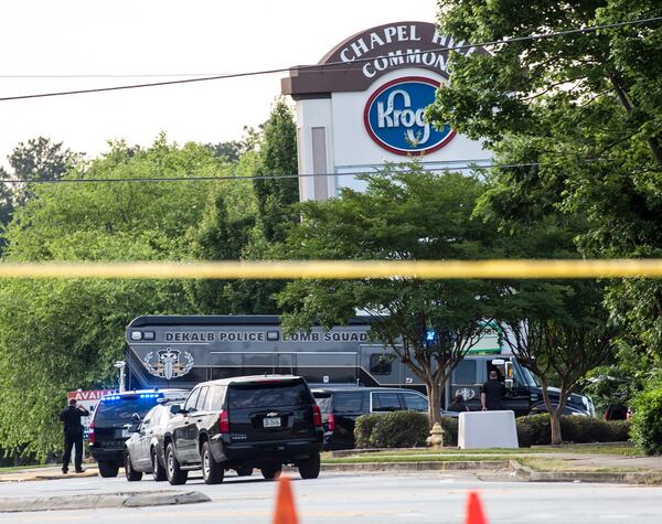 The DeKalb County police bomb squad arrives at the Kroger to help with a bomb threat. Police blocked off several blocks in the area.