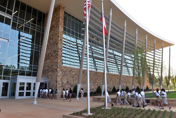 THAT NEW SCHOOL SMELL--AUGUST 7, 2014 ATLANTA The front entrance of the school. The Charles R Drew Charter School Junior and Senior Academy at the Charlie Yates Campus is shown Thursday, August 7, 2014. The $55 million school is Gold LEED certified, features solar panels for electricity, a football/soccer field and track and has a 500-seat auditorium among other amenities. The school was built on the former back nine holes of the Charlie Yates Golf Course in the East Lake Village area. The school, which opened for the school year, July 29th, houses approximately 450 students in grades 6-10 currently and plans are to add 11th and 12th grades in the next two years. KENT D. JOHNSON/KDJOHNSON@AJC.COM