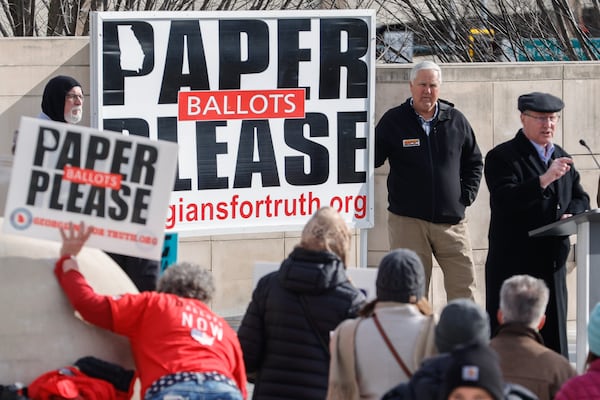 Supporters of paper ballots gathered Monday to protest in Liberty Plaza outside the Georgia Capitol. (Natrice Miller/ Natrice.miller@ajc.com)