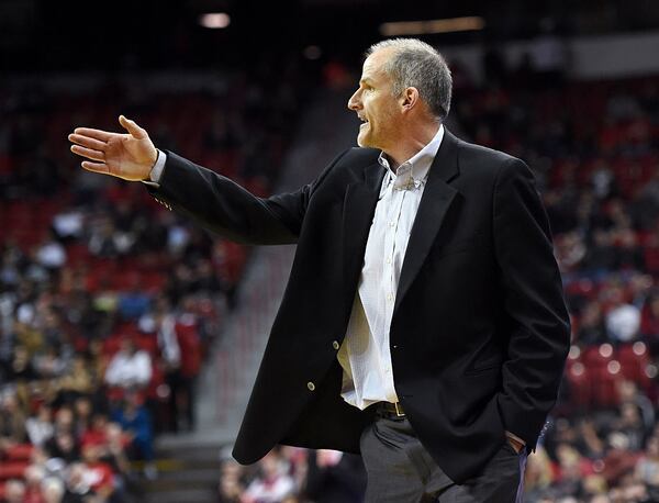 LAS VEGAS, NV - DECEMBER 17: Head coach Eric Reveno of the Portland Pilots gestures to his players during their game against the UNLV Rebels at the Thomas &amp; Mack Center on December 17, 2014 in Las Vegas, Nevada. UNLV won 75-73 in overtime. (Photo by Ethan Miller/Getty Images)