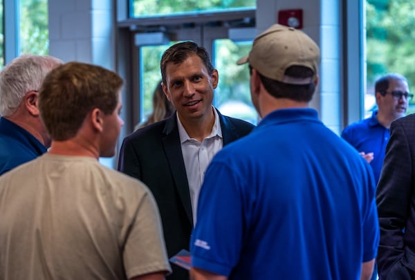 Rowen Foundation President Mason Ailstock (center) answers questions and responds to feedback during the foundation's "Imagine Rowen" event on June 9 in Dacula. (Courtesy of Rowen Foundation)