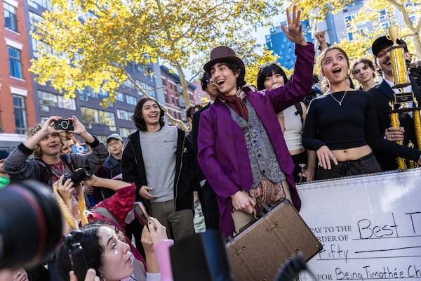 FILE - Miles Mitchell, 21, winner of the Timothee Chalamet lookalike contest near Washington Square Park, Sunday, Oct. 27, 2024, in New York. (AP Photo/Stefan Jeremiah, File)