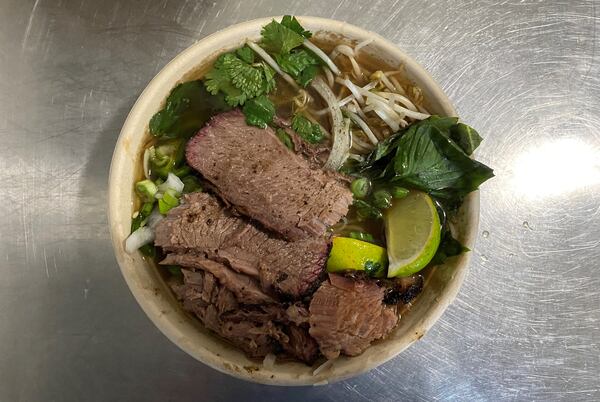 Pho Cue makes a very good version of its namesake dish, this one with smoked beef brisket. (Wendell Brock for The Atlanta Journal-Constitution)