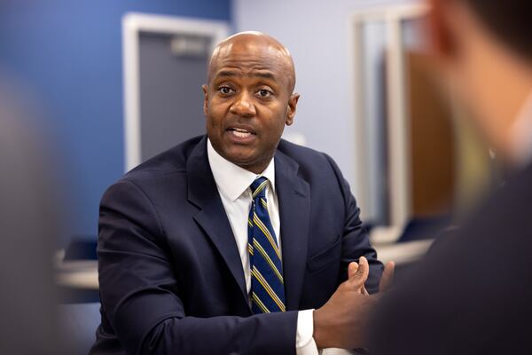 Northern District of Georgia U.S. Attorney Ryan Buchanan speaks during a press interview at the district attorney’s office in Atlanta on Friday, July 12, 2024. Public safety officials presented findings from a report on repeat offenders. (Arvin Temkar / AJC)