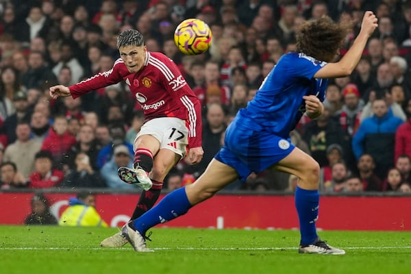 Manchester United's Alejandro Garnacho scores his side's third goal during the English Premier League soccer match between Manchester United and Leicester City, at the Old Trafford stadium in Manchester, England, Sunday, Nov.10, 2024. (AP Photo/Jon Super)