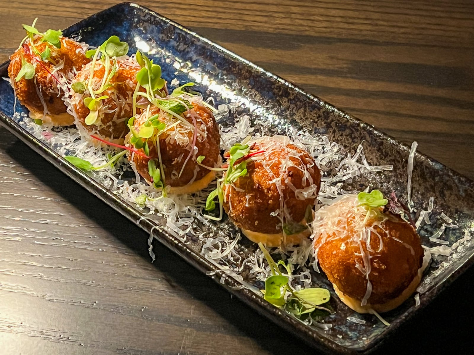 The ham croquettes at Silla del Toro were wonderfully cheesy, thanks to the generous incorporation of manchego. Henri Hollis/henri.hollis@ajc.com