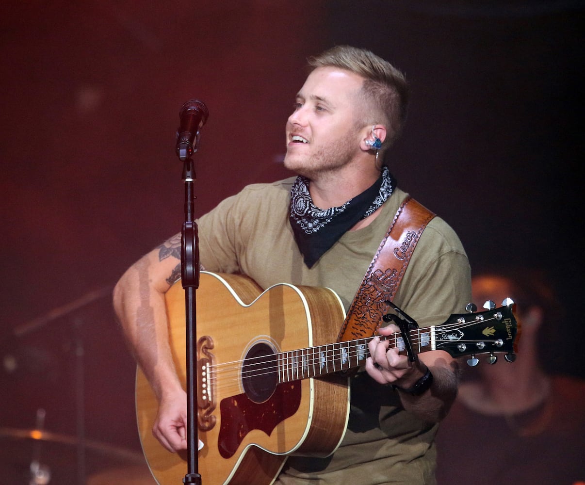 Corey Kent performs as one of the opening acts when chart-topping Jason Aldean made a tour stop at Atlanta's Lakewood Amphitheatre on Saturday, August 5, 2023. (Photo: Robb Cohen for The Atlanta Journal-Constitution)