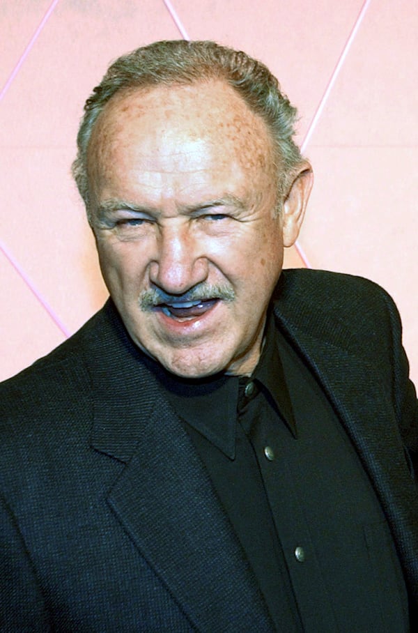 FILE - "The Royal Tenenbaums" cast member Gene Hackman poses at the premiere of the film in the Hollywood section of Los Angeles, Dec. 6, 2001. (AP Photo/Chris Pizzello, File)