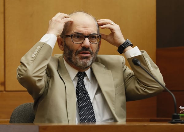 4/16/18 - Atlanta - Dr. Mark Pressman, a sleep disorder expert from Pennsylvania who also teaches at the Villanova School of Law testifies as a rebuttal witness during the Tex McIver murder trial at the Fulton County Courthouse on Thursday, April 12, 2018. Bob Andres bandres@ajc.com