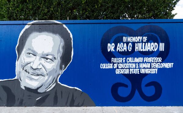 An updated mural honoring longtime Georgia State University professor Asa G. Hilliard III on its downtown Atlanta campus on Wednesday, August 21, 2024. GSU has plans to fill the Blue Line path around the campus with more art. (Seeger Gray / AJC)