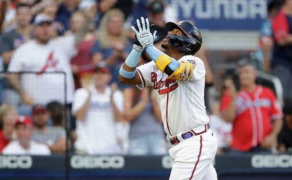 Braves outfielder Ronald Acuna celebrates after hitting a home run off St. Louis Cardinals pitcher Kwang Hyun Kim in the third inning of the second game of a doubleheader on Sunday, June 20, 2021, at Truist Park in Atlanta. (Ben Margot/AP)