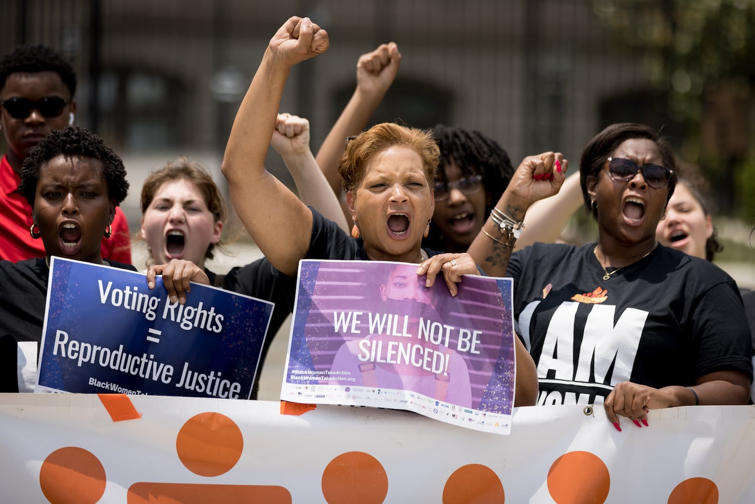 Abortion rights activists with Georgia Stand Up rally in front of the Georgia State Capitol following the Supreme Court ruling overturning Roe v. Wade on Friday, June 24, 2022. (Arvin Temkar / arvin.temkar@ajc.com)