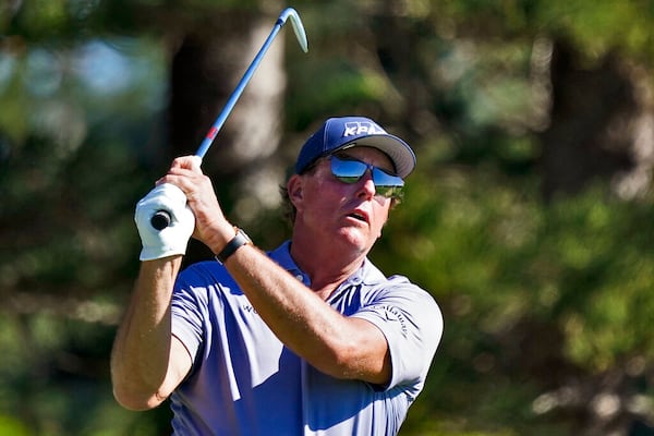 Phil Mickelson plays his shot from the second tee during the second round of the Tournament of Champions golf event, Friday, Jan. 7, 2022, at Kapalua Plantation Course in Kapalua, Hawaii. (AP Photo/Matt York)