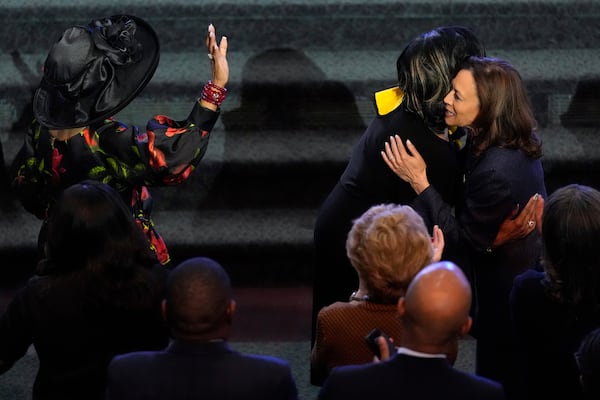 Democratic presidential nominee Vice President Kamala Harris, right, attends a church service at Greater Emmanuel Institutional Church of God in Christ, Sunday, Nov. 3, 2024, in Detroit. (AP Photo/Jacquelyn Martin)