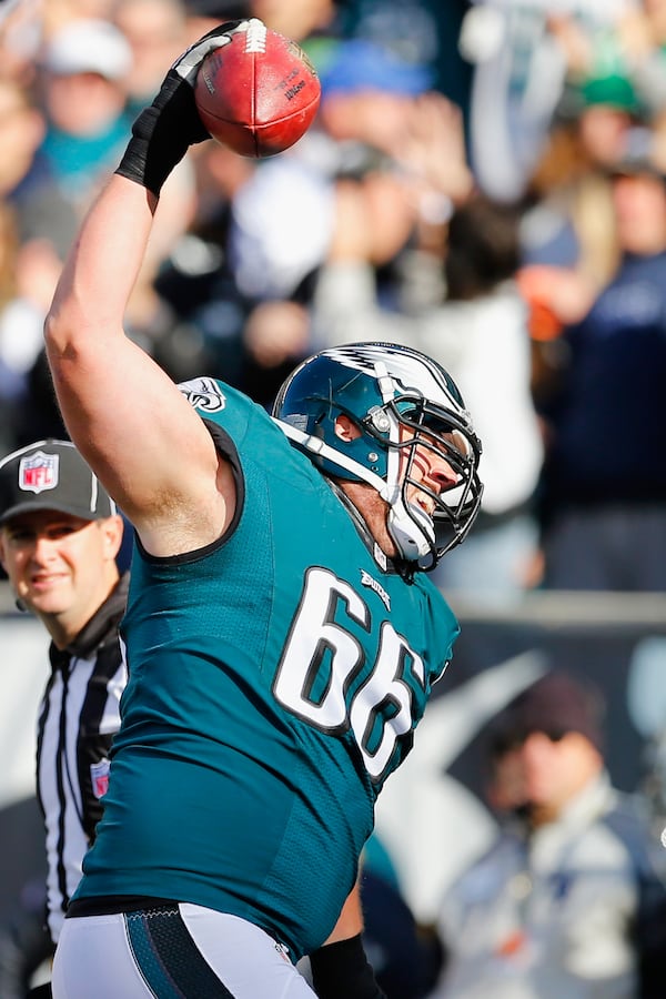 PHILADELPHIA, PA - NOVEMBER 23: Andrew Gardner #66 of the Philadelphia Eagles spikes the ball after Darren Sproles #43 (not pictured) of the Philadelphia Eagles scored a first quarter touchdown against the Tennessee Titans at Lincoln Financial Field on November 23, 2014 in Philadelphia, Pennsylvania. (Photo by Rich Schultz/Getty Images)