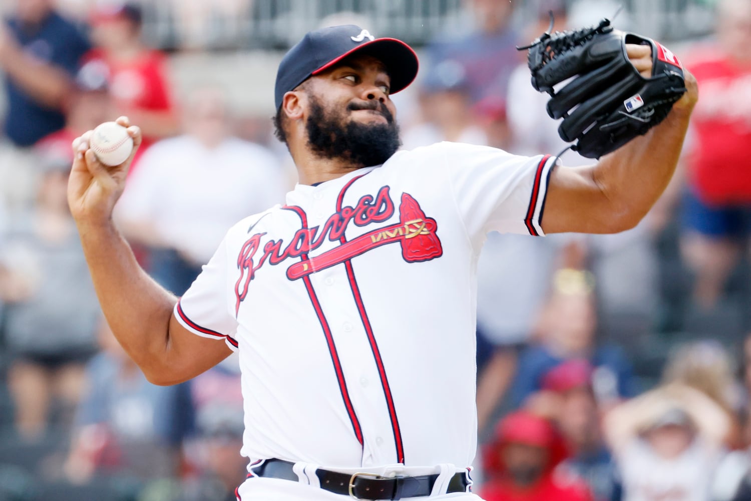 Atlanta Braves closer Kenley Jansen delivers for the final out against the Pirates on Sunday at Truist Park. (Miguel Martinez / miguel.martinezjimenez@ajc.com)