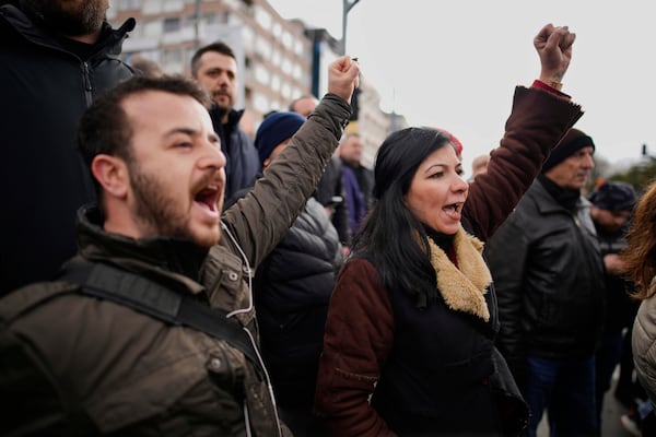 People chant slogans as they protest the arrest of Istanbul Mayor Ekrem Imamoglu in Istanbul, Turkey, Wednesday, March 19, 2025. (AP Photo/Emrah Gurel)