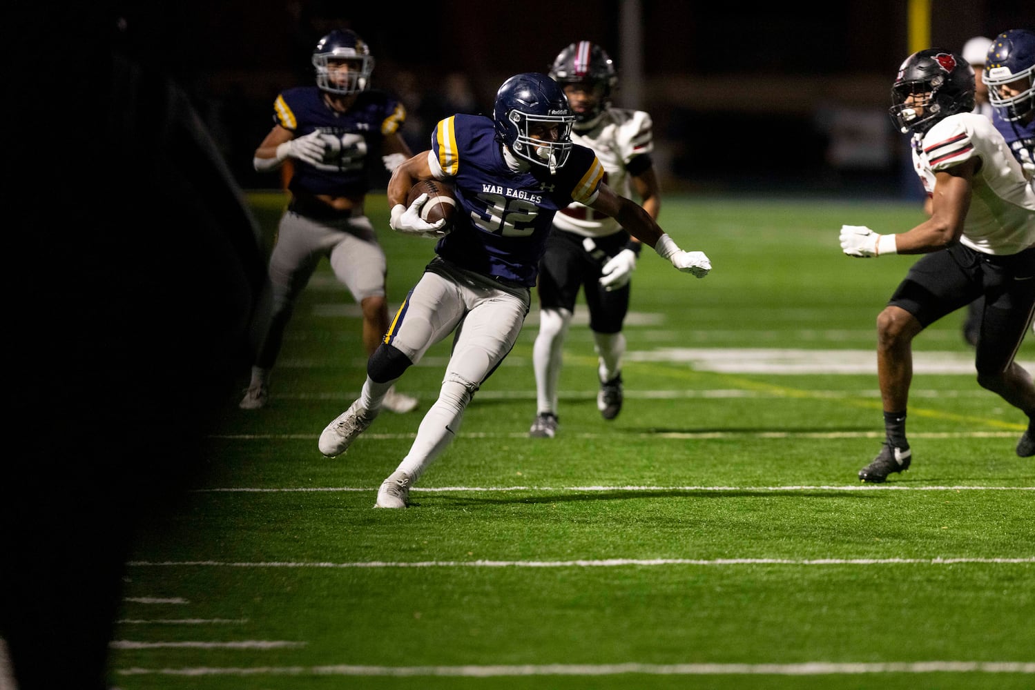 Marist’s Brayden Lewis (32) runs the ball during a NCAA High School football game between Marist and Warner Robins at Marist High School in Atlanta, GA., on Friday, November 15, 2024. (Photo/Jenn Finch, AJC)