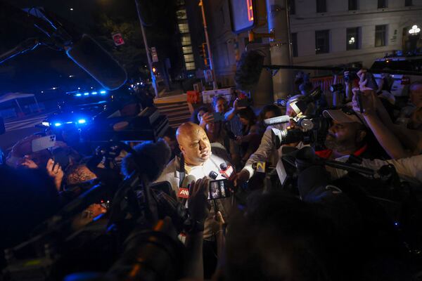 Independent journalist George Chidi speaks to members of the media as he leaves the Fulton County Courthouse in Atlanta on Monday, August 14, 2023. Fulton prosecutors are presenting their election interference case against former President Donald Trump and others to a grand jury. (Jason Getz / Jason.Getz@ajc.com)