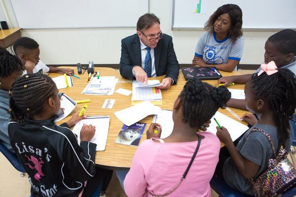 Fulton County Schools Superintendent Mike Looney helps lead a lesson as he tours Evoline C. West Elementary School during its summer school program in Fairburn on Thursday, June 13, 2019. Looney’s first official day on the job is Monday, June 17. Starting Monday, June 17, Looney will lead Georgia’s fourth largest school district, which has a general fund budget of more than $1 billion. CASEY SYKES FOR THE ATLANTA JOURNAL-CONSTITUTION