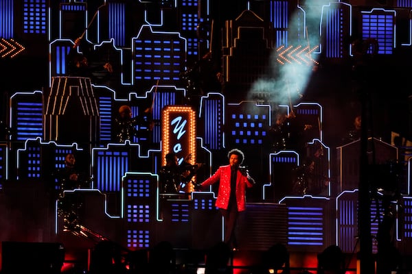 The Weeknd performs during halftime of the NFL Super Bowl 55 football game between during the halftime show of the NFL Super Bowl 55 football game between the Kansas City Chiefs and Tampa Bay Buccaneers, Sunday, Feb. 7, 2021, in Tampa, Fla. (AP Photo/Ashley Landis)