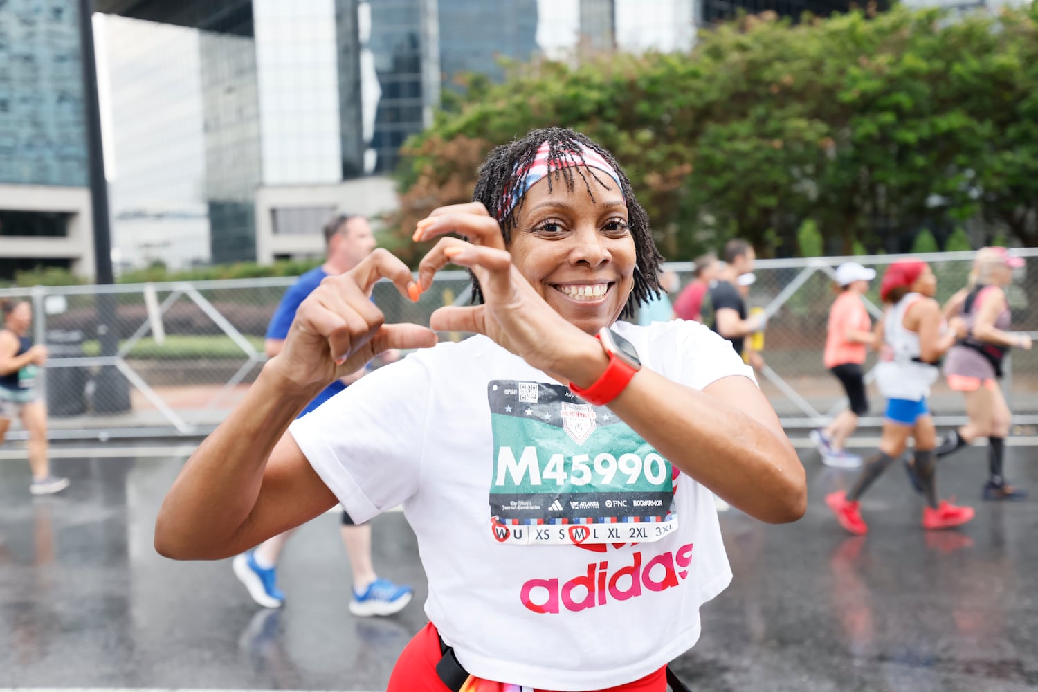 Runners take part in the 54th running of the Atlanta Journal-Constitution Peachtree Road Race in Atlanta on Tuesday, July 4th, 2023.   (Miguel Martinez / Miguel.Martinezjimenez@ajc.com)