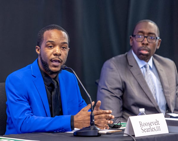 Roosevelt Searles III, from left, and Richard Wright participate in the Atlanta Regional Mayoral Forum, moderated by Bill Bolling, and centered around Atlanta's housing challenges and takes place in two parts Wednesday, Oct 6, 2021.  Candidates in the first set of questions include Atlanta City Councilman Antonio Brown, councilman Andre Dickens, attorney Sharon Gay, council president Felicia Moore and former mayor Kasim Reed. The second group of candidates include Kirsten Dunn, Nolan English, Mark Hammad, Kenny Hill, Rebecca King, Roosevelt Searles III, Richard Wright.  (Jenni Girtman for The Atlanta Journal-Constitution)