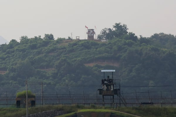 Military guard posts of North Korea, rear, and South Korea, foreground, are seen in Paju on Tuesday.