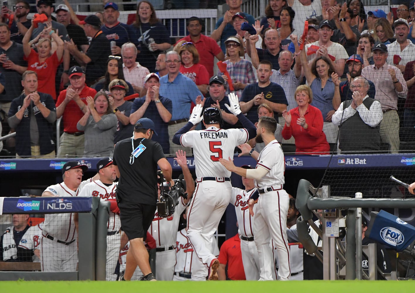 Photos: Acuna, Freeman lead Braves to playoff win over Dodgers