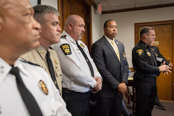 Sheriffs appear at a hearing on HB 1105 in the Senate Public Safety Committee at the Capitol in Atlanta on Wednesday, March 13, 2024. Among other things, the bill would require jailers and sheriffs to report to U.S. Immigration and Customs Enforcement when someone in custody lacks legal documentation. (Arvin Temkar / arvin.temkar@ajc.com)