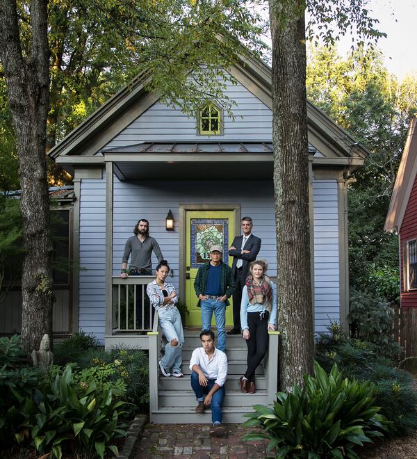 Ryan Vo (seated) and the rest of the cast from Actor's Express' "Hometown Boy": Daniel Parvis (from left), Michelle Pokopac, Glenn Kubota, Chris Kayser and Allison Dayne.