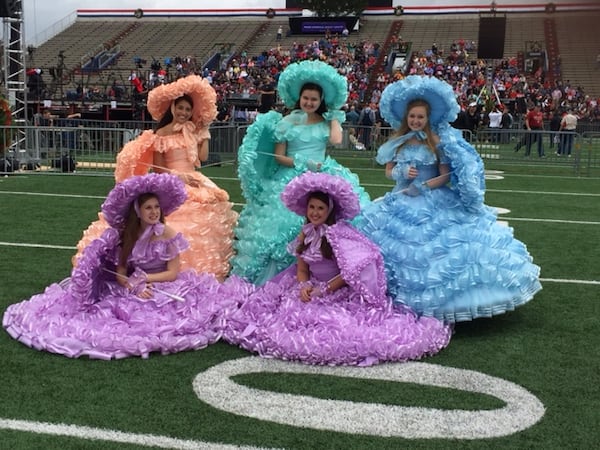  Dressed in antebellum dresses, the Azalea Trail Maids appeared at a victory rally in Mobile, Alabama, last month featuring President Donald Trump and U.S. Sen. Jeff Sessions. (Alan Judd/ajudd@ajc.com)