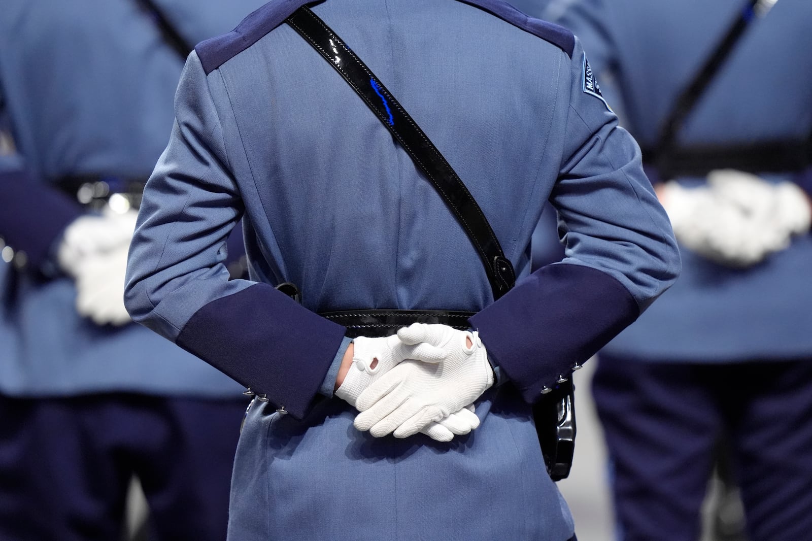 Members of the 90th Recruit Training Group of the Massachusetts State Police stand in formation, Wednesday, Oct. 9, 2024, during swearing in ceremonies at the DCU Center, in Worcester, Mass. (AP Photo/Steven Senne)