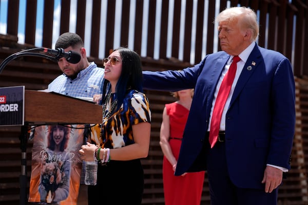 FILE - Republican presidential nominee former President Donald Trump comforts Alexis Nungaray and Joamel Guevara, mother and uncle of Jocelyn Nungaray, during an event along the southern border with Mexico, Thursday, Aug. 22, 2024, in Sierra Vista, Ariz. (AP Photo/Evan Vucci, File)