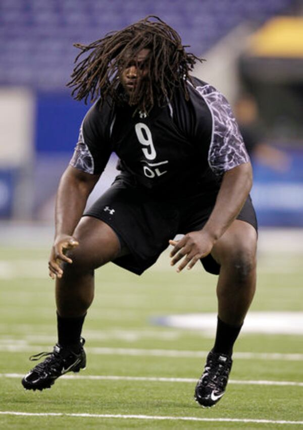 Alabama offensive lineman James Carpenter takes part in shuttle drills.